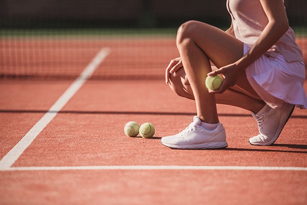 tennis ball boy and girl